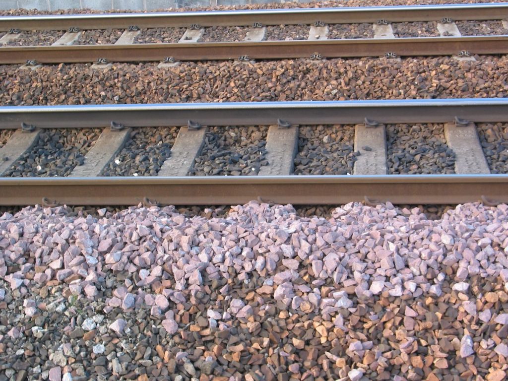 Railway tracks with track ballast